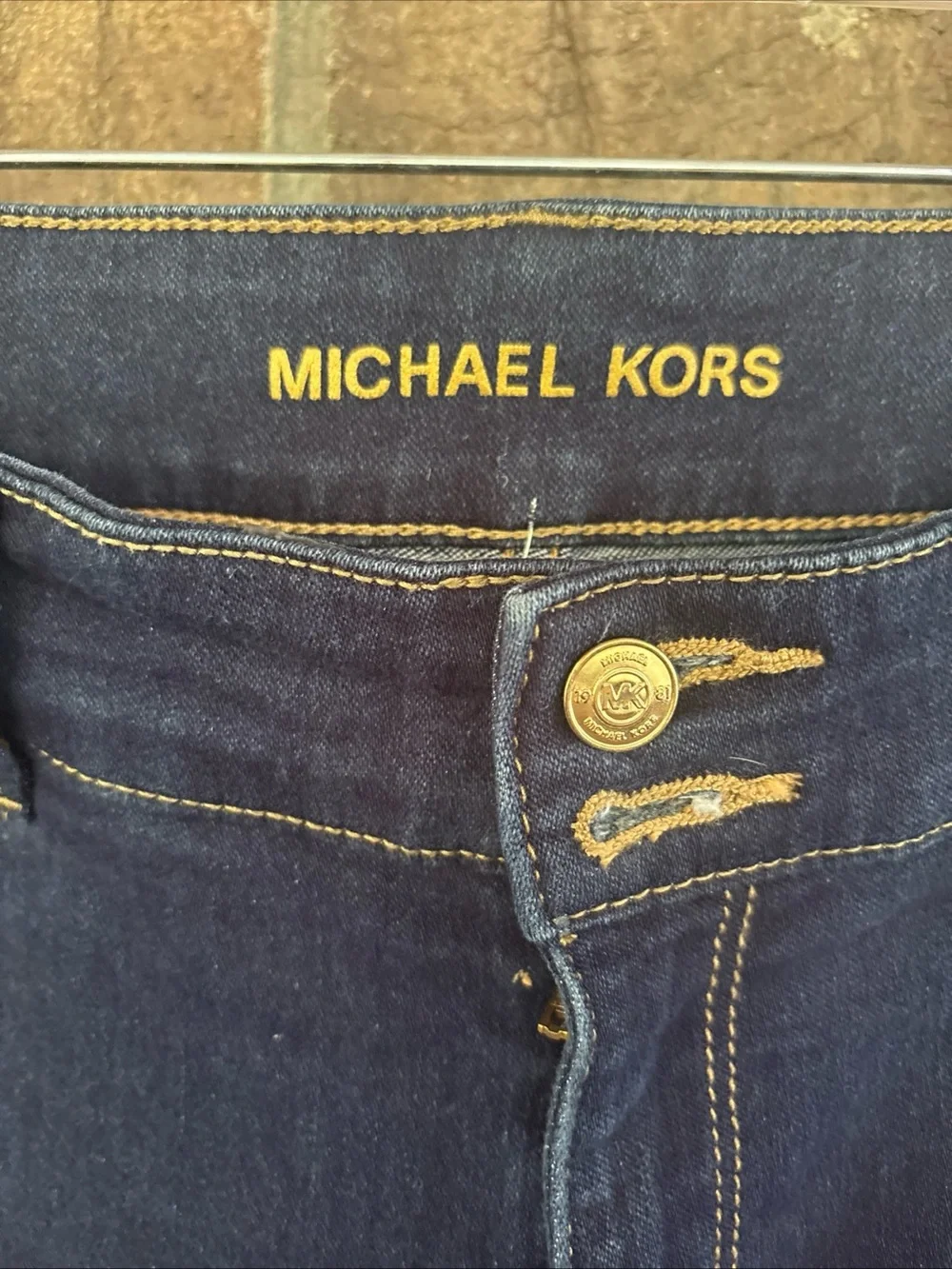 Michael Kors Dark Navy Straight-Leg Jeans with Gold Hardware